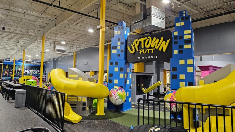 Slides, buildings, and other obstacles make up the mini-golf course at Slick City Action Park in Woodridge.