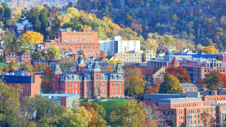 Buildings stand adopt undulating hills in Morgantown, West Virginia