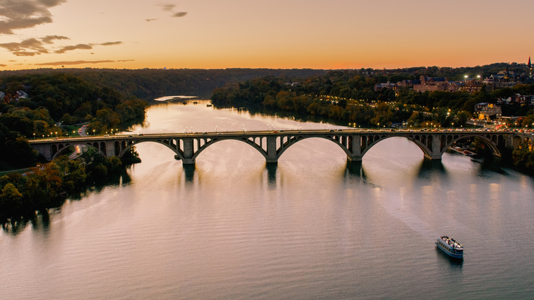 A boat passes beneath a bridge over the Potomac River, Washington, D.C.