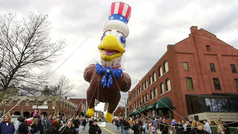 Giant bald eagle balloon in American hat during America's Hometown Thanksgiving Celebration