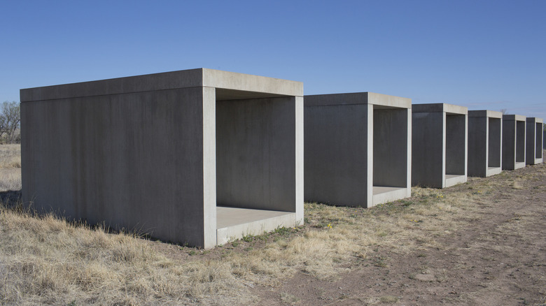 Sculptures dominate the desert landscape at the Chinati Foundation in Marfa, Texas