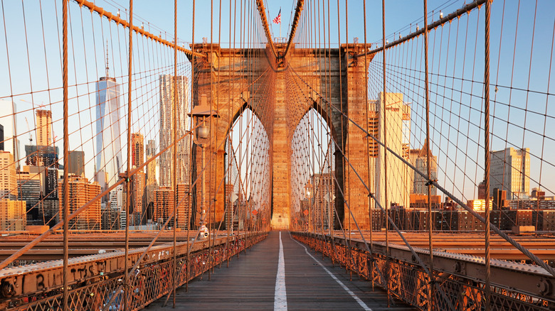 Pedestrian paths on the Brooklyn Bridge during sunset