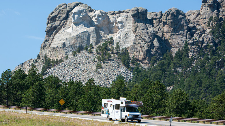 An RV driving past Mount Rushmore in South Dakota