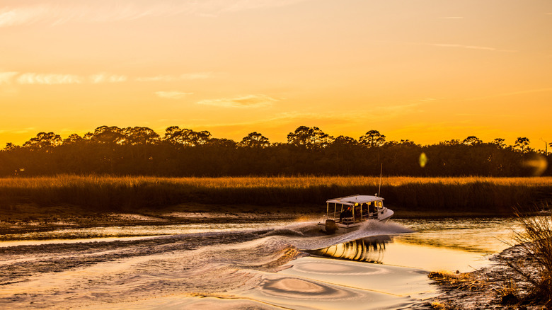 boat on the water at sunset