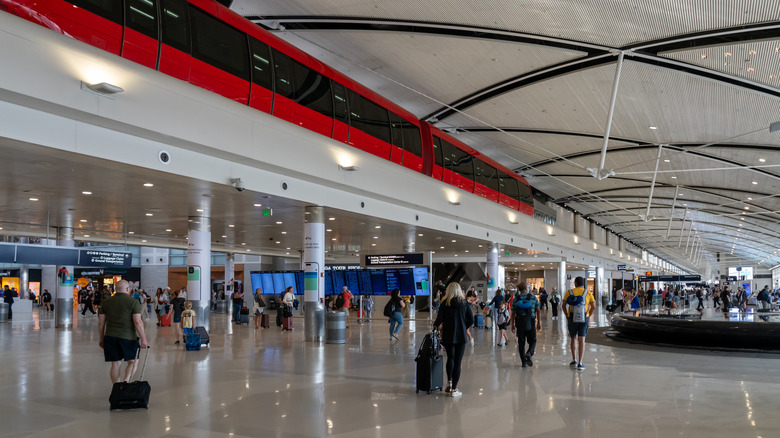 People moving through the Detroit Metropolitan Wayne County Airport