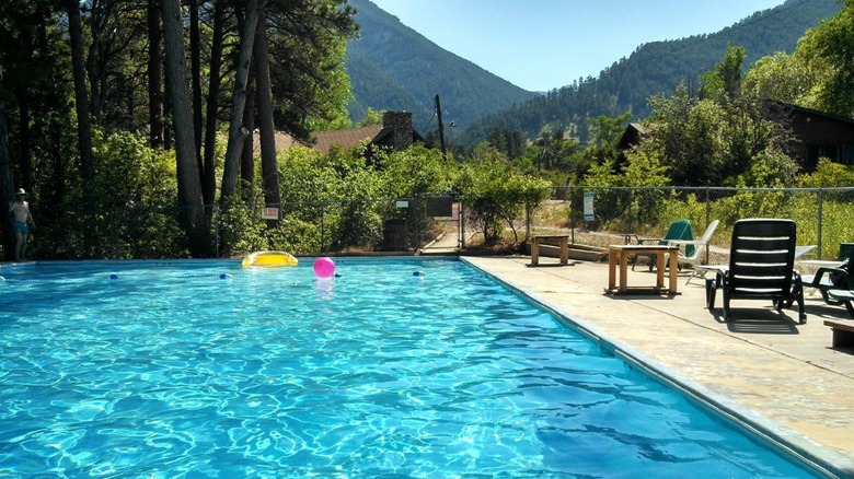 The pool with mountain views at Eatons' Dude Ranch