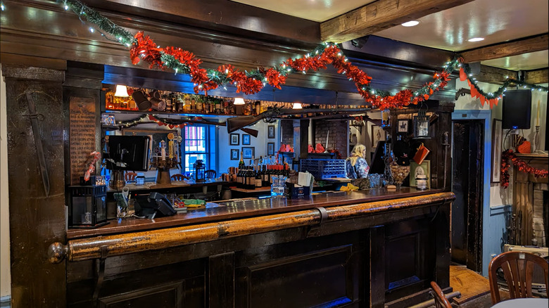 The bar at the '76 House, decorated with tinsel for the winter holidays