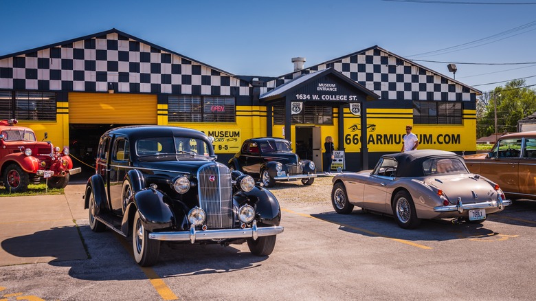 Classic cars in front of the Route 66 Car Museum in Springfield, MO.