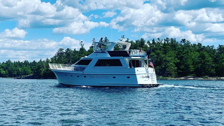A typical Great Loop boat motoring along a waterway