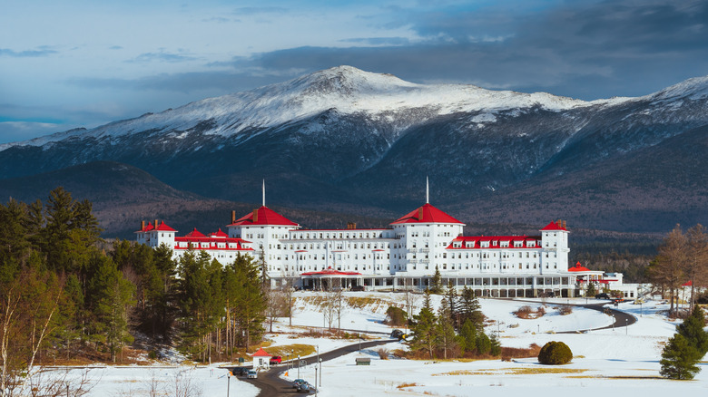 The facade of the Omni Mount Washington Resort in Bretton Woods, NH from afar.