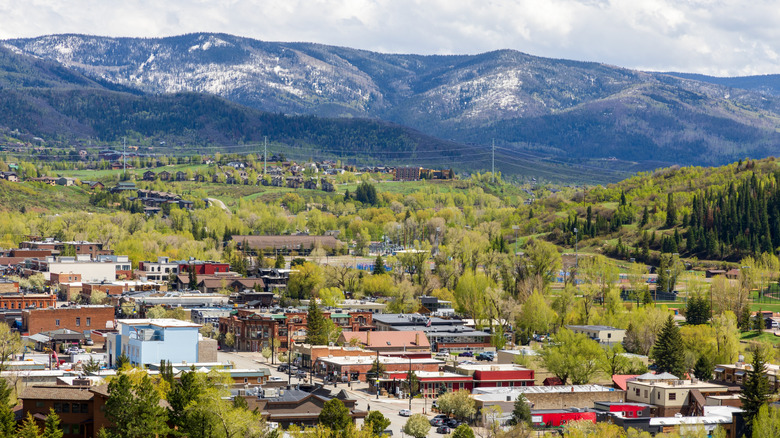 Snow-topped mountains tower over Steamboat Spring's historic downtown.