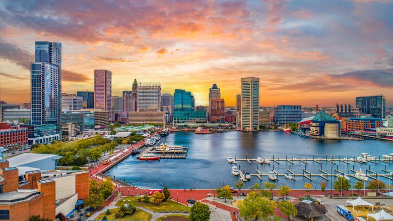 Baltimore buildings and water at sunset