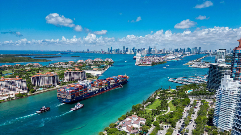 Aerial view of boats, buildings, and coastline in Miami