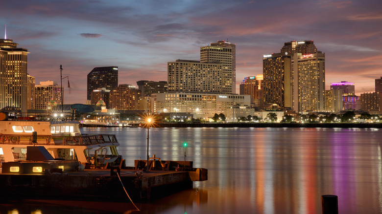New Orleans skyline at night from harbor