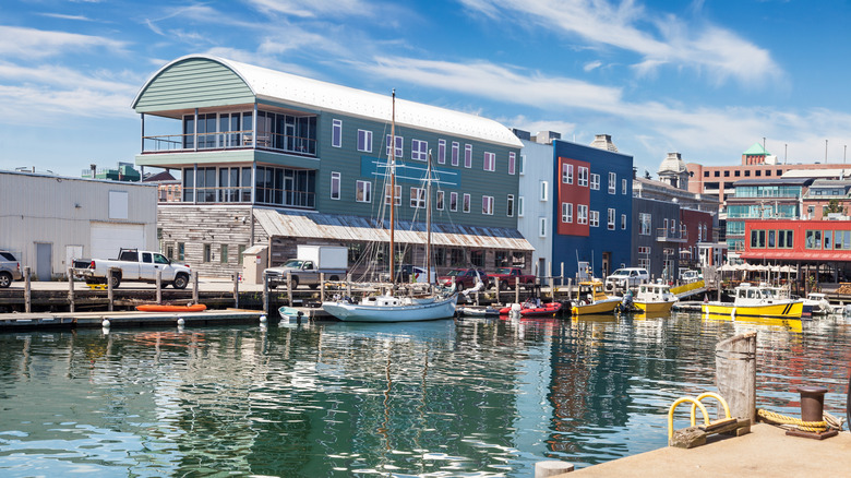 Boats and colorful buildings along Portland wharf