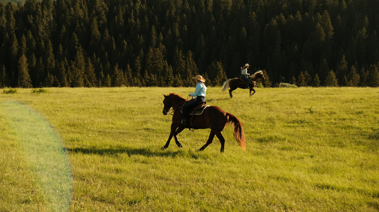 A woman riding a horse in Big Sky, Montana