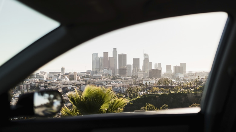 The LA skyline through a car window