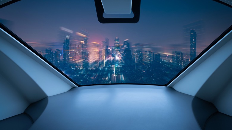 futuristic view of a city seen through a plane display