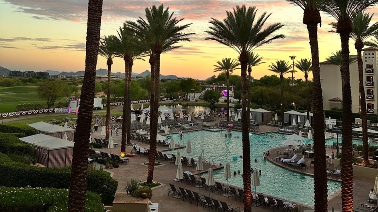 Fairmont Scottsdale Princess pool and palm trees at sunset