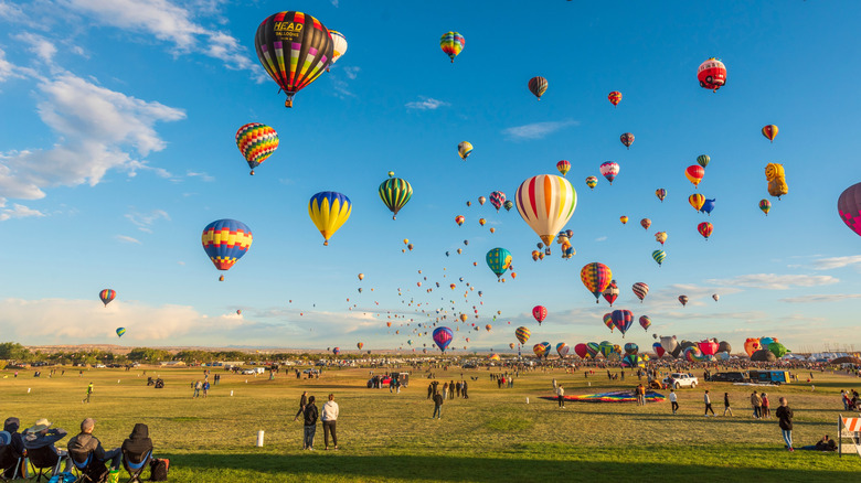 People watching the Albuquerque Balloon Fiesta near Rio Rancho, New Mexico