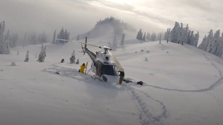 Panoramic view of snow-capped mountains, heli-skiing experience through Eleven Revelstoke Lodge