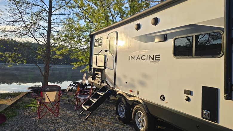 A trailer parked at a waterfront campsite at Paul Grist State Park, Alabama
