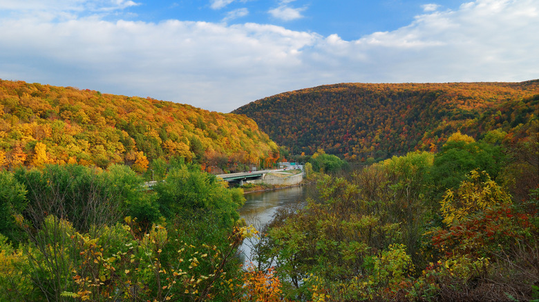 A lake surrounded by fall foliage in the Pocono Mountains of Pennsylvania