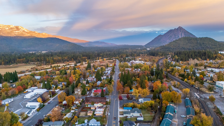 An aerial view of Mount Shasta City with Black Butte visible in in the background