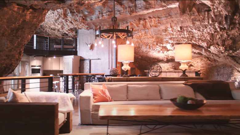 A view of the living room and kitchen area inside of Beckham Creek Lodge
