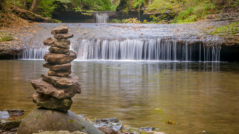 Cairn in front of the lower cascades in Glen Helen Nature Preserve in Yellow Springs, Ohio