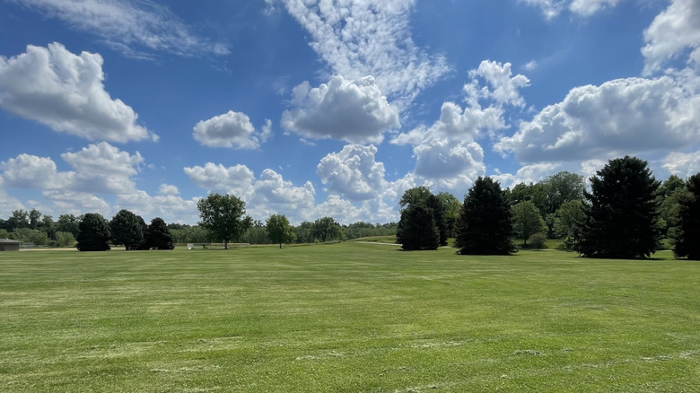 Field in James A. Bible Park on a partly cloudy day