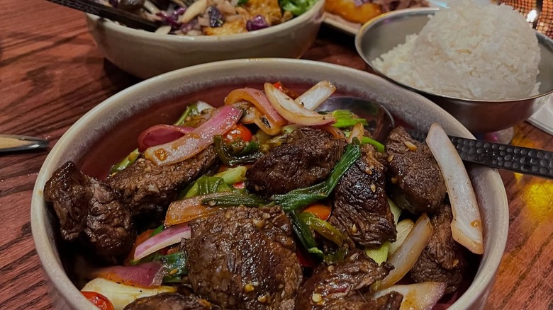 Food bowl and rice on table at Tonga Room & Hurricane Bar