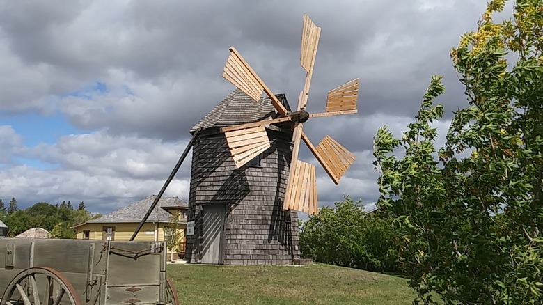 Windmill and wagon at the Arborg & District Multicultural Heritage Village in Manitoba, Canada