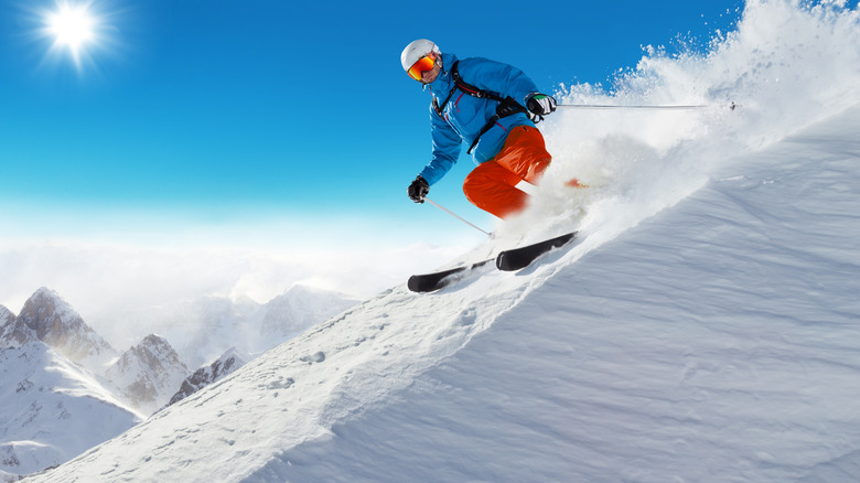 Skier skiing downhill