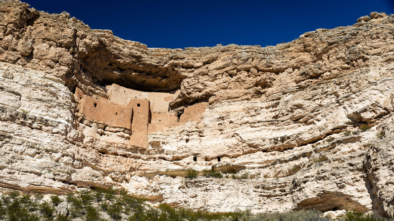Montezuma Castle cliff dwellings built into limestone cliff at Montezuma Castle National Monument