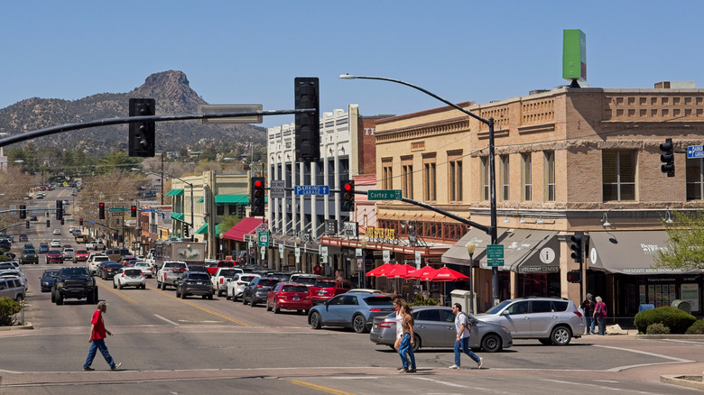 Downtown Prescott Arizona with storefronts and people walking around