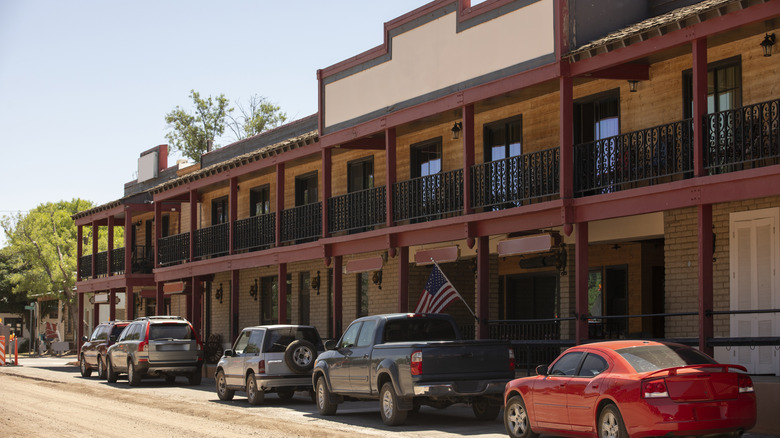 Cars parked outside buildings in downtown Patagonia, AZ