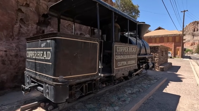 Copperhead locomotive next to Clifton Cliff Jail in Arizona