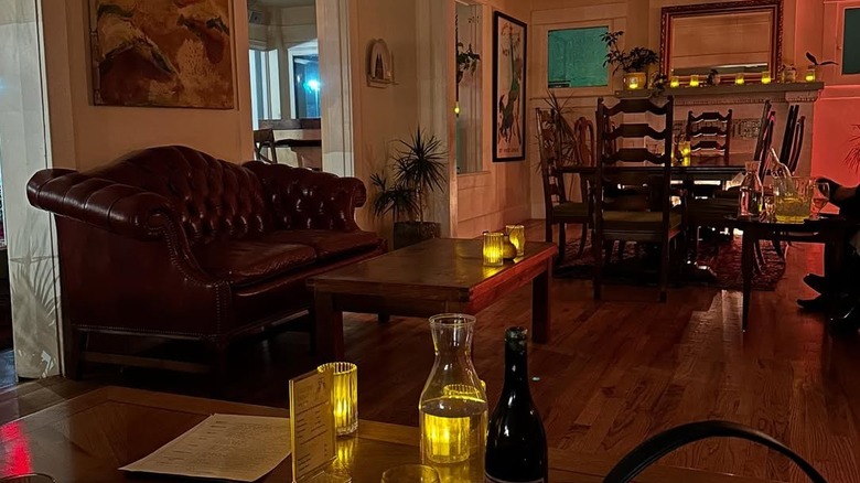 Room inside Sauvage Wine Bar with dim lighting