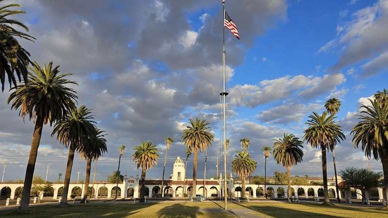 Ajo's Plaza is a long colonial-style building surrounded by green space