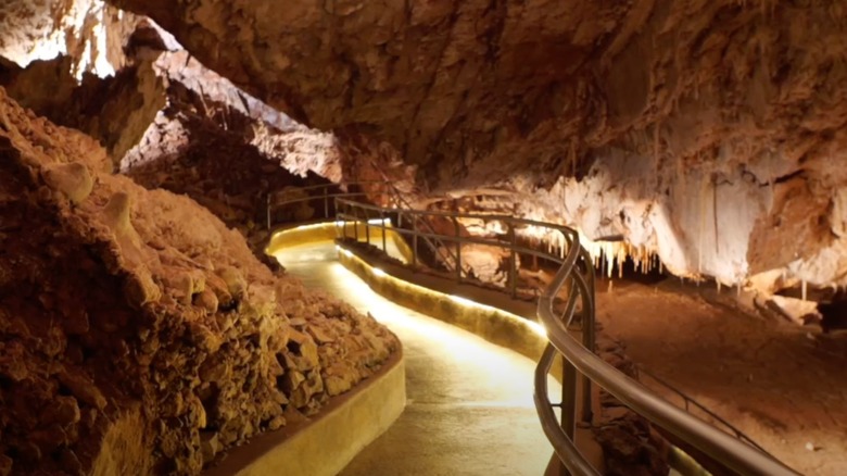 Kartchner Caverns lighted walkway in rocky cave