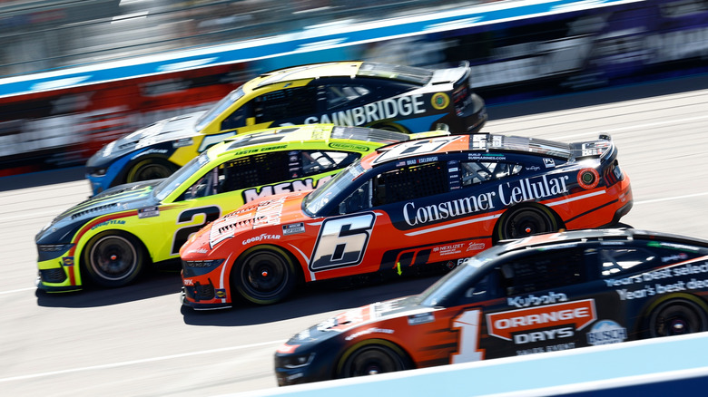 NASCAR drivers fighting for position in Avondale