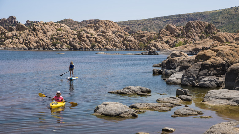People paddleboarding on Watson Lake in Arizona