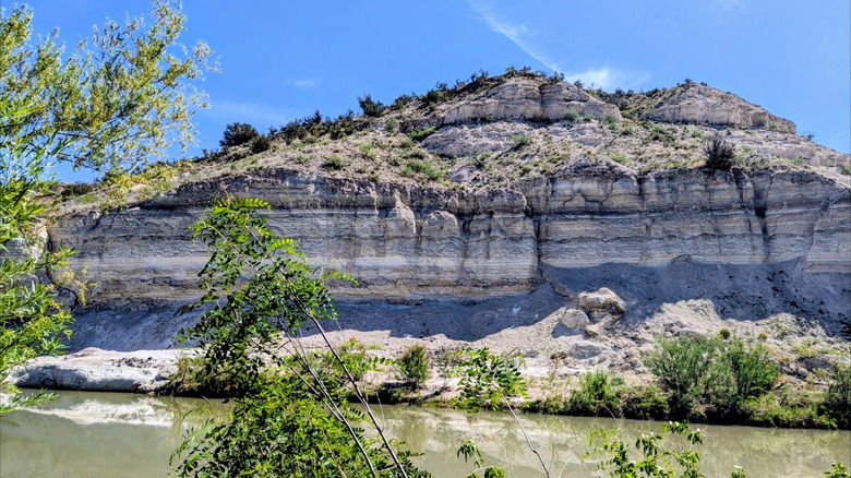 Limestone bluffs and the Verde River flowing through Rockin' River Ranch State Park, Arizona