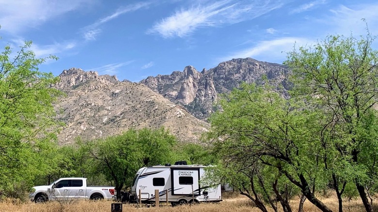 RV camper and pickup parked at Catalina State Park in Tucson