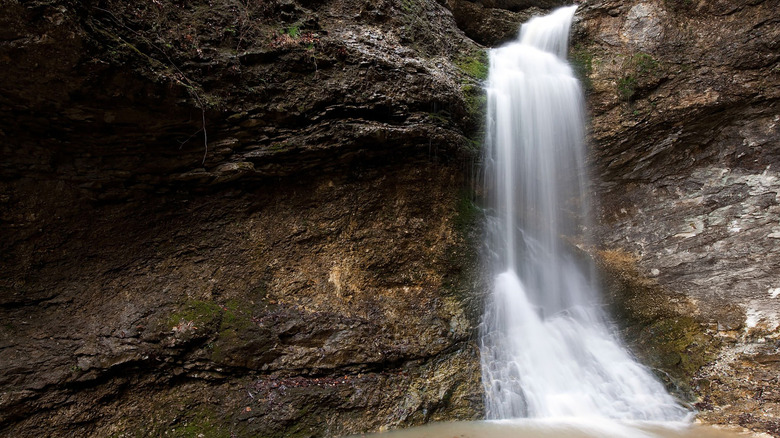 A waterfall flowing down a cliff in Arkansas