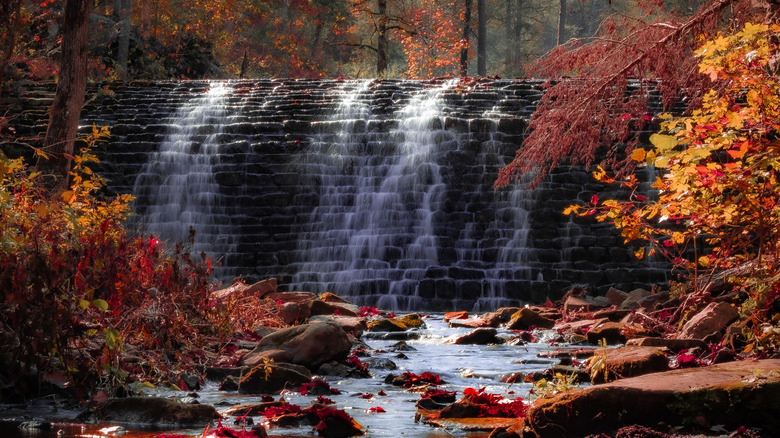 Waterfall in Arkansas surrounded by fall foliage