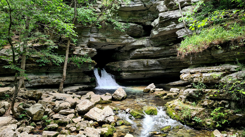 Waterfall and bluffs at the Blanchard Springs Caverns in Arkansas