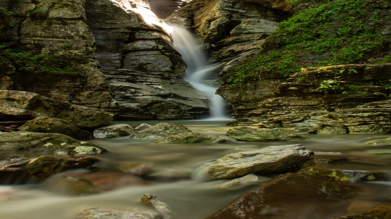 Water flowing down the middle of the Eye of the Needle rock formation