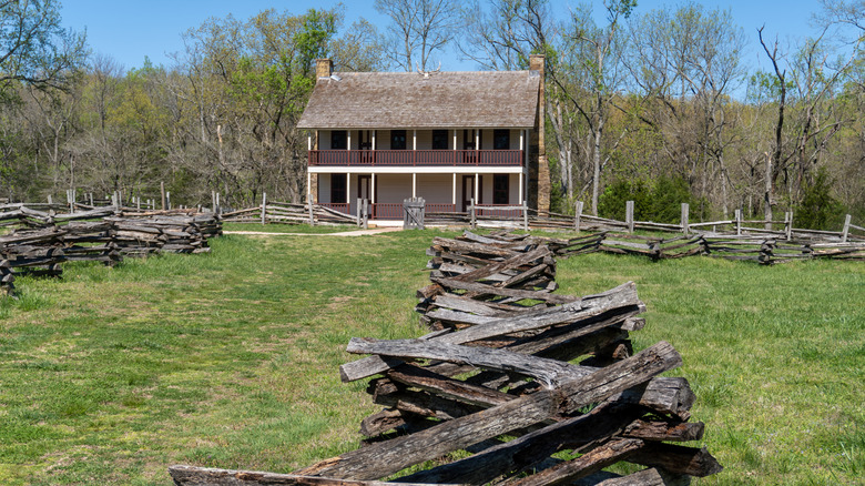 The Elkhorn Tavern in Pea Ridge National Military Park with wood fencing in Arkansas